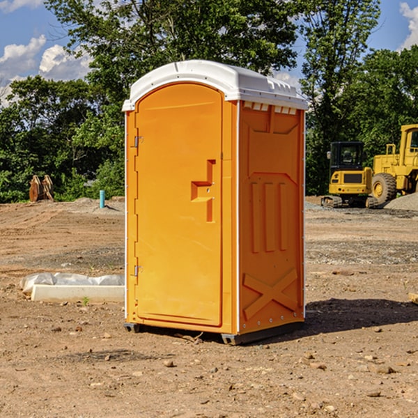 how often are the porta potties cleaned and serviced during a rental period in Tatums